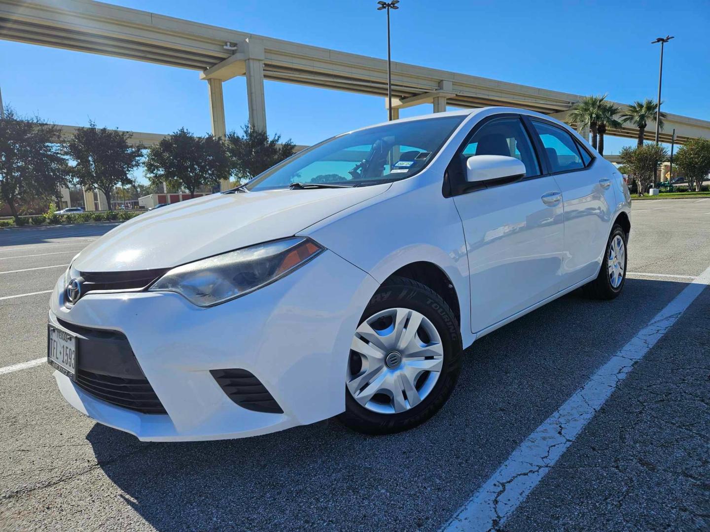 2014 white Toyota Corolla (5YFBURHE7EP) , located at 5005 Telephone Rd., Houston, TX, 77087, (713) 641-0980, 29.690666, -95.298683 - Photo#0